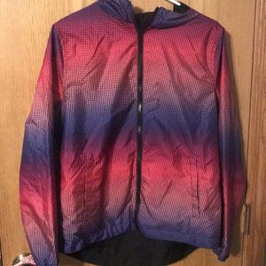 Reverse-able wind breaker with pockets